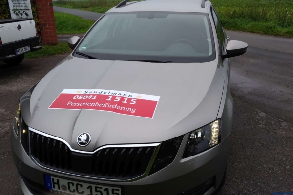 fahrzeugbeschriftung-taxi-sandelmann-01-h850F9261966-A97B-7424-E2AD-B8C2C0A5CB86.jpg